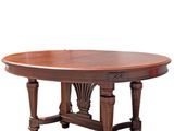 an oval dining table with a wooden base and carved legs