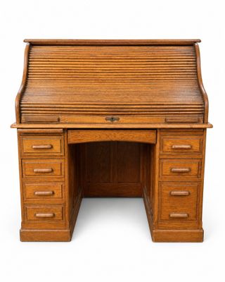 un bureau ancien en chêne à abattant et à tiroirs