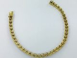 a yellow gold bracelet with square links and a clasp