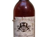 a bottle of wine that is sitting on a table