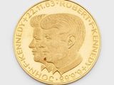 une image représentant un gros plan d'une pièce d'or sur laquelle figure le visage d'un homme