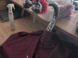 a table with a bunch of items on it and a bottle of water