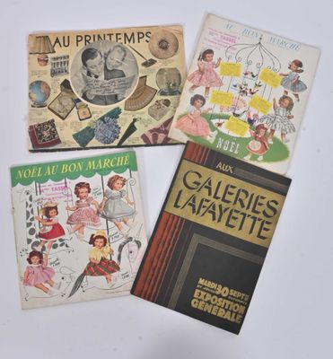 three children ' s books are lined up on a white surface