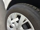 a close up of a tire with a sticker on it