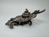 a metal object that is sitting on a table