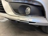 a close up of the front bumper of a car