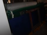 a picture of a room with a roll of fabric on the wall