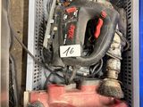 a box with tools in it sitting on the floor