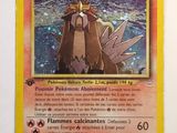 the pokemon card has a picture of a bird on it
