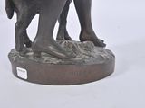 a statue of a man riding a horse on a pedestal