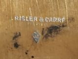 a close up of a wooden box with a label on it
