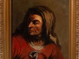 portrait d'une vieille femme vêtue d'un manteau rouge et d'une écharpe blanche
