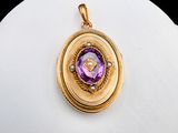 an image of a gold and amethorate pendant on a white mannequin