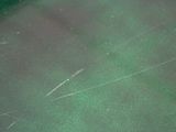 a close up of a tennis ball on a tennis court