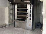 a room with a stove and oven inside of it