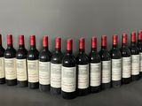 a group of bottles of wine sitting on top of a table