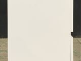 a piece of white paper sitting on the ground