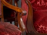 two chairs that are sitting next to each other in a room