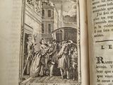 an open book with a picture of a man being taken out of a building