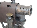 a close up of an old sewing machine on a white background