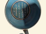 a blue bowl that is sitting on a stand