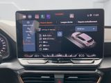 the dashboard of a car with a digital display in the center