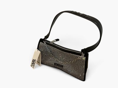 an image of a purse with a tag on it