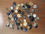 a lot of buttons that are on a table