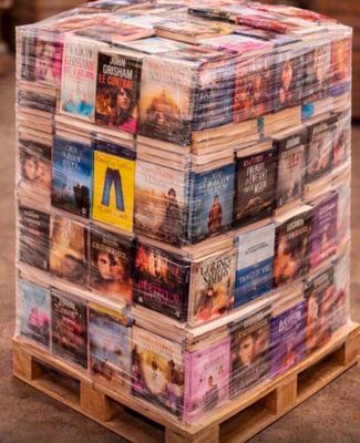 a stack of dvds stacked on top of a pallet