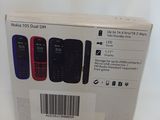 packaging of a nokia cell phone sitting on top of a white table