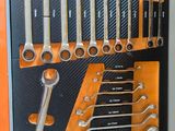 a picture of a tool box with a variety of wrenches in it