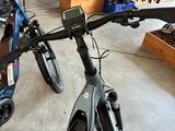 two bikes that are parked in a garage