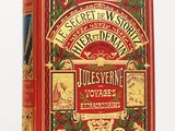 un livre rouge orné de lettres dorées et d'illustrations