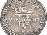 gros plan d'une pièce de monnaie surmontée d'une couronne