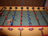 a foosball table that is sitting on the floor
