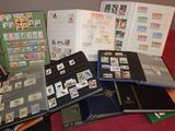 a lot of different types of stamps on a table