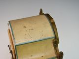 a small drum that is sitting on top of a table