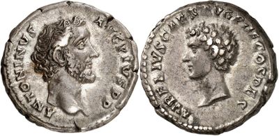 a silver coin with an image of a woman on it