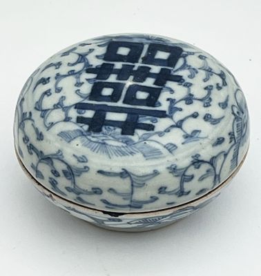 a blue and white box with a design on it