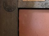 a picture of a picture of a door with a nameplate on it