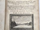 un livre ouvert dans lequel figure l'image d'une ville