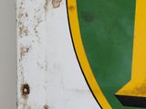 a green and yellow sign with the letter d on it