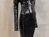 a black sequinized dress on a mannequin mannequin mannequin mannequin mannequin mannequin mannequin mannequin
