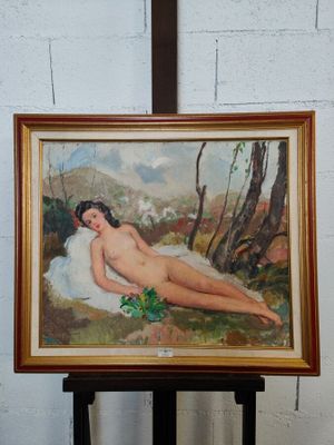un tableau représentant une femme nue allongée sur un oreiller