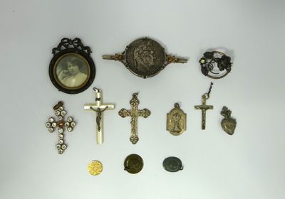 a lot of religious items that are on the table