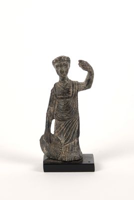 statue of a woman holding a bowl on a wooden base