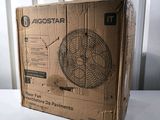 a cardboard box that has a fan inside of it