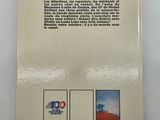 the back cover of a book with a picture of a man on top of a hill