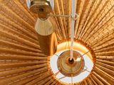 a light that is hanging from the ceiling in the room