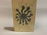 a small box with a drawing of a flower on it